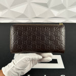Gucci Brown Monogram Zippy (332747-525040)